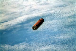 External tank as it drops from the shuttle back to Earth